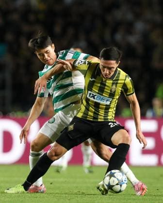 Yerkin Tapalov of Kairat Almaty and Yang Hyun-Jun of Celtic Kairat Almaty v Celtic, UEFA Champions League, Play-Off Round, Second Leg, Football, Almaty Central Stadium, Almaty, Kazakhstan - 26 Aug 2025Almaty Almaty Central Stadium Kazakhstan EDITORIAL USE ONLY No use with unauthorised audio, video, data, fixture lists, club league logos or live services. Online in-match use limited to 120 images, no video emulation. No use in betting, games or single club league player publications. Copyright: xNikitaxBassov Shutterstockx 15455823ai