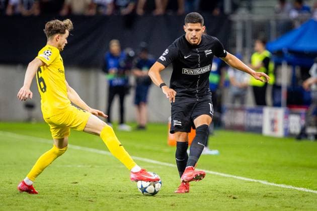 STURM GRAZ vs BODO GLIMT Emir Karic of Sturm and Hakon Evjen of Bodo during second leg of play off round of UEFA Champions League football match between SK Sturm Graz and FK Bodo Glimt. Worthersee Stadion, Klagenfurt, Austria, August 26, 2025. Photo by Branislav Racko Copyright: xx 080A7486