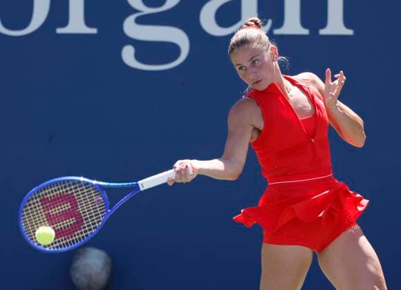 Marta Kostyuk of Ukraine returns a ball to Katie.Boulter of United Kingdom in the second set of their first round match in the Grandstand court on day 3 at the 2025 US Open Tennis Championship at the USTA Billie Jean King National Tennis Center in New York City on Tuesday, August 26, 2025. Kostyuk defeated Boulter in straight sets.  NYP20250826114 JOHNxANGELILLO
