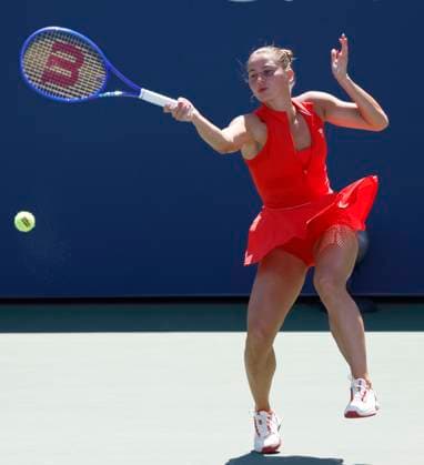 Marta Kostyuk of Ukraine returns a ball to Katie.Boulter of United Kingdom in the second set of their first round match in the Grandstand court on day 3 at the 2025 US Open Tennis Championship at the USTA Billie Jean King National Tennis Center in New York City on Tuesday, August 26, 2025. Kostyuk defeated Boulter in straight sets.  NYP20250826115 JOHNxANGELILLO