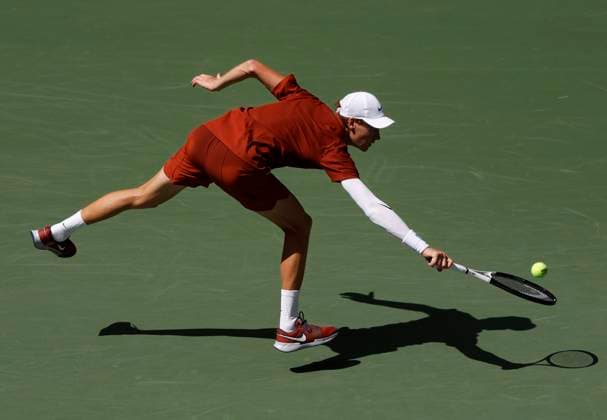 Jannik Sinner of Italy stretches out to return a ball to Vit Kopriva of Czechia in the 2nd set of their first round match in Arthur Ashe Stadium on day 3 at the 2025 US Open Tennis Championship at the USTA Billie Jean King National Tennis Center in New York City on Tuesday, August 26, 2025.  NYP20250826123 JOHNxANGELILLO
