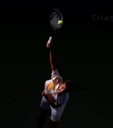 Vit Kopriva of Czechia serves to Jannik Sinner of Italy in the 3rd set of their first round match in Arthur Ashe Stadium on day 3 at the 2025 US Open Tennis Championship at the USTA Billie Jean King National Tennis Center in New York City on Tuesday, August 26, 2025.  NYP20250826129 JOHNxANGELILLO