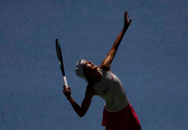 Emiliana Arango of Colombia serves to Iga Swiatek of Poland in their first round match in Arthur Ashe Stadium on day 3 at the 2025 US Open Tennis Championship at the USTA Billie Jean King National Tennis Center in New York City on Tuesday, August 26, 2025. Swiatek defeated Arango in straight sets.  NYP20250826102 JOHNxANGELILLO
