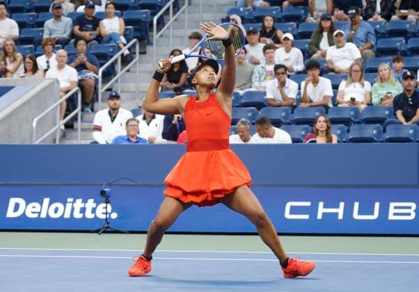 Naomi Osaka of Japan hits an overhead in the first set of first round match against Greet Minnen of Belgium in Louis Armstrong Stadium on day 3 at the 2025 US Open Tennis Championship at the USTA Billie Jean King National Tennis Center in New York City on Tuesday, August 26, 2025.  NYP20250826143 JOHNxANGELILLO