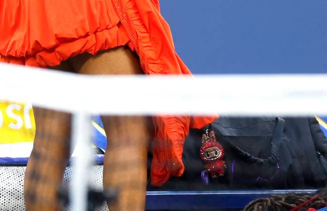 Naomi Osaka of Japan has a Labubu hanging from her bag when she arrives on the court for her first round match against Greet Minnen of Belgium in Louis Armstrong Stadium on day 3 at the 2025 US Open Tennis Championship at the USTA Billie Jean King National Tennis Center in New York City on Tuesday, August 26, 2025.  NYP20250826148 JOHNxANGELILLO