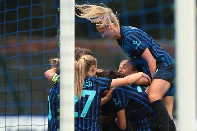 Milan, Italy, 27th August 2025. Karolina Lea Vilhjalmsdottir of FC Internazionale celebrates with team mates after scoring to give the side a 1-0 lead during the SK Brann vs FC Internazionale Women UEFA Womens Champions League match at Youth Development Centre, Milan. Picture credit should read: Jonathan Moscrop Sportimage EDITORIAL USE ONLY. No use with unauthorised audio, video, data, fixture lists, club league logos or live services. Online in-match use limited to 120 images, no video emulation. No use in betting, games or single club league player publications. SPI_020_JM_SKBRANN_INTER_UWCL SPI-4080-0020