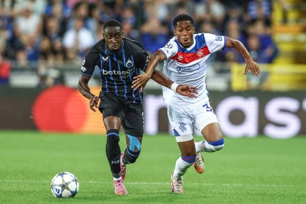 Club s Carlos Forbs and Rangers Jayden Meghoma fight for the ball during a soccer game between Belgian Club Brugge KV and Scottish Glasgow Rangers F.C., Wednesday 27 August 2025 in Brugge, the return leg of the play-offs for the Champions League tournament. Club won the first leg 1-3. BRUNOxFAHY  x132598361x