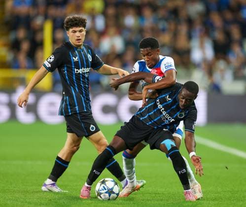 Jayden Meghoma of Rangers in action with Carlos Forbs of Club Brugge during the Champions League second leg play off match at the Jan Breydel Stadium, Brugge. Club Brugge v Rangers - UEFA - Champions League Play-offs - Jan Breydel Stadium, Belguim - 27 Aug 2025Brugge Jan Breydel Stadium Belgium EDITORIAL USE ONLY  Copyright: xO Rourke RangersxFC Shutterstockx 15459058bz