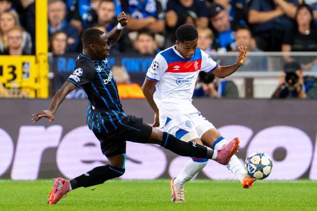 2025-08-27 Club Brugge v Rangers - UEFA Champions League Play-offs Round Second Leg BRUGGE, BELGIUM - AUGUST 27: Carlos Forbs of Club Brugge battles for the ball with Jayden Meghoma of Rangers during the UEFA Champions League Play-offs Round Second Leg match between Club Brugge and Rangers at Jan Breydel Stadium on August 27, 2025 in Brugge, Belgium. Brugge Jan Breydel Stadium Belgium Content not available for redistribution in The Netherlands directly or indirectly through any third parties. Copyright: xJorisxVerwijstx