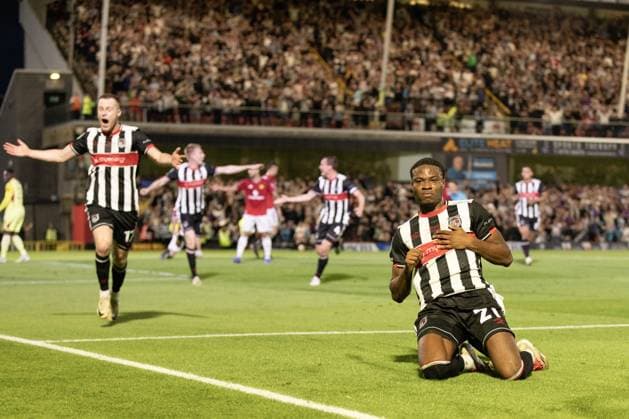 Grimsby Town FC v Manchester United, ManU EFL Cup 27 08 2025. GOAL 2 - 0 Tyrell Warren of Grimsby Town scores a goal and celebrates during the EFL Cup match between Grimsby Town FC and Manchester United at Blundell Park, Grimsby, United Kingdom on 27 August 2025. Editorial use only DataCo restrictions apply See www.football-dataco.com , Copyright: xJezxTighex PSI-22699-0051