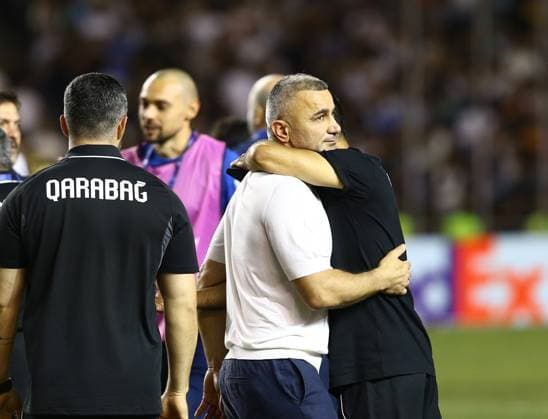 Qarabag celebrate Champions League qualification after victory over Ferencvaros in Baku BAKU, AZERBAIJAN - AUGUST 27: Qarabag head coach Gurban Gurbanov joins the celebrations and salutes the fans as Qarabag players celebrate with their fans after defeating Hungary’s Ferencvaros to qualify for the UEFA Champions League during the play-off round match between Qarabag and Ferencvaros in Baku, Azerbaijan on August 27, 2025. Resul Rehimov Anadolu Baku Azerbaijan. Editorial use only. Please get in touch for any other usage.  Copyright: x2025xAnadoluxResulxRehimovx