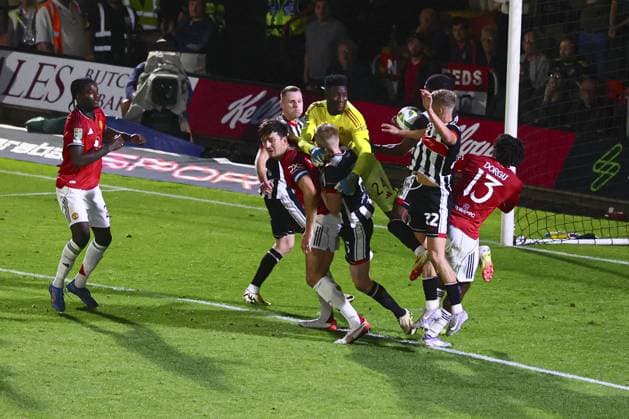 Andre Onana of Manchester United, ManU flaps at the ball which leads to the 2nd goal by Tyrell Warren of Grimsby Town Grimsby Town v Manchester United, EFL Carabao Cup, Second Round, Football, Blundell Park, Grimsby, UK - 27 Aug 2025Grimsby Blundell Park United Kingdom EDITORIAL USE ONLY No use with unauthorised audio, video, data, fixture lists, club league logos or live services. Online in-match use limited to 120 images, no video emulation. No use in betting, games or single club league player publications.  Copyright: xPaulxCurrie Shutterstockx 15457582br