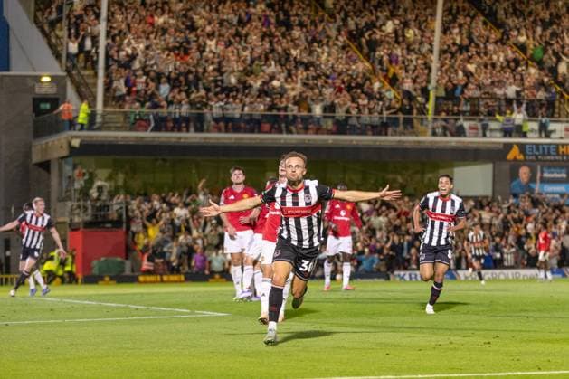 Grimsby Town FC v Manchester United, ManU EFL Cup 27 08 2025. GOAL 1 - 0 Charles Vernam of Grimsby Town scores a goal and celebrates during the EFL Cup match between Grimsby Town FC and Manchester United at Blundell Park, Grimsby, United Kingdom on 27 August 2025. Editorial use only DataCo restrictions apply See www.football-dataco.com , Copyright: xJezxTighex PSI-22699-0081