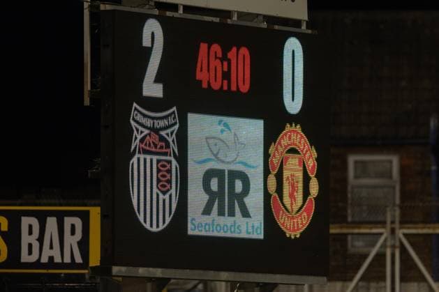 Grimsby Town FC v Manchester United, ManU EFL Cup 27 08 2025. A general view inside Blundell Park score board half time during the EFL Cup match between Grimsby Town FC and Manchester United at Blundell Park, Grimsby, United Kingdom on 27 August 2025. Editorial use only DataCo restrictions apply See www.football-dataco.com , Copyright: xJezxTighex PSI-22699-0088