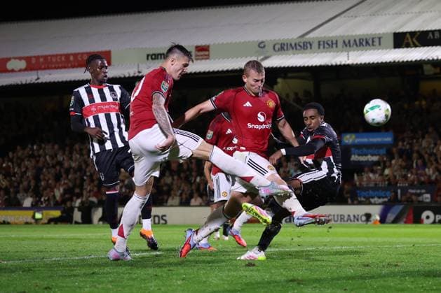 Benjamin Sesko of Manchester United, ManU shoots Grimsby Town v Manchester United, EFL Carabao Cup, Second Round, Football, Blundell Park, Grimsby, UK - 27 Aug 2025Grimsby Blundell Park United Kingdom EDITORIAL USE ONLY No use with unauthorised audio, video, data, fixture lists, club league logos or live services. Online in-match use limited to 120 images, no video emulation. No use in betting, games or single club league player publications.  Copyright: xRyanxBrowne Shutterstockx 15457581bv