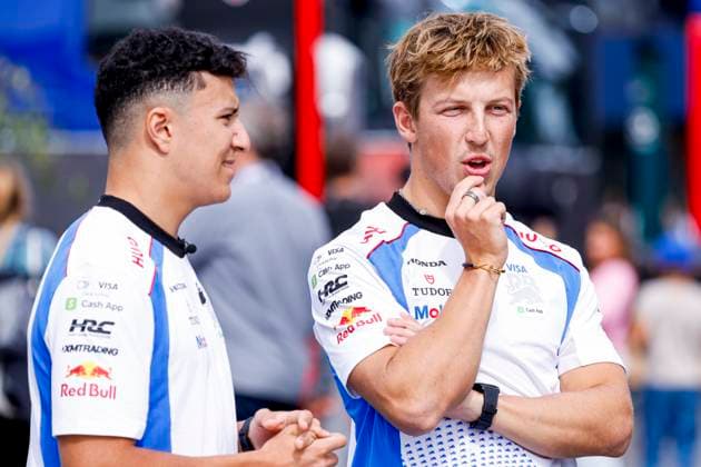 Liam Lawson of New Zealand and Racing Bulls looks on and Isack Hadjar of France and Racing Bulls prior to the start of the Formula 1 Heineken Dutch Grand Prix 2025 at Circuit Zandvoort on August 28, 2025 in Zandvoort, Netherlands Photo by Marcel ter Bals DeFodi Images