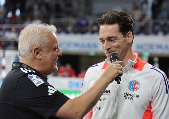 28 08 2025 Handball 1 Bundesliga DAIKIN HBL Season 2025 2026 01 Matchday HC Erlangen Metropolitan Region Nuremberg HCE THW Kiel DaMa xdaxmax Ole Rahmel Interview with sports manager HC Erlangen HCE