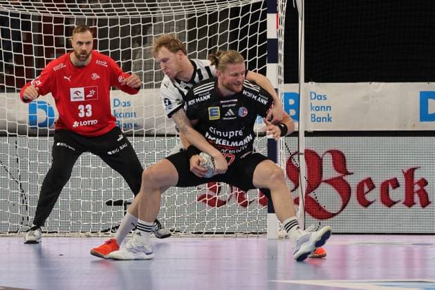 28 08 2025 Handball 1 Bundesliga DAIKIN HBL Season 2025 2026 01 Matchday HC Erlangen Metropolregion Nürnberg HCE THW Kiel DaMa xdaxmax Andreas Wolff 33, THW Kiel Eric Johansson 21, THW Kiel Maciej Gebala 77, HC Erlangen HCE