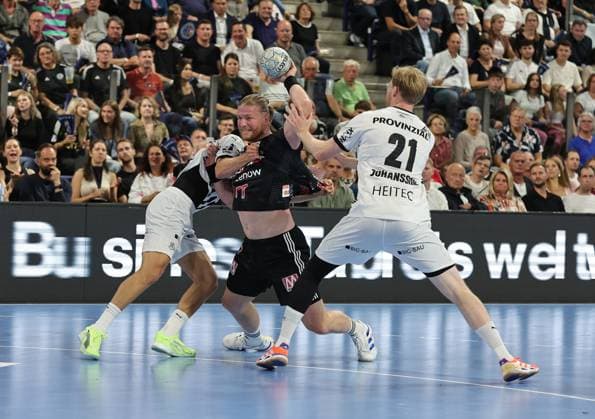 28 08 2025 Handball 1 Bundesliga DAIKIN HBL Season 2025 2026 01 Matchday HC Erlangen Metropolregion Nürnberg HCE THW Kiel DaMa xdaxmax Rune Dahmke 23, THW Kiel Maciej Gebala 77, HC Erlangen HCE Eric Johansson 21, THW Kiel