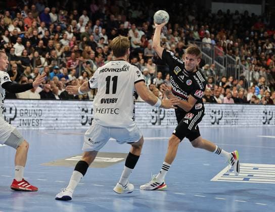 28 08 2025 Handball 1 Bundesliga DAIKIN HBL Season 2025 2026 01 Matchday HC Erlangen Metropolregion Nürnberg HCE THW Kiel DaMa xdaxmax Petter Overby 11, THW Kiel Sander Andreassen Overjordet 8, HC Erlangen HCE