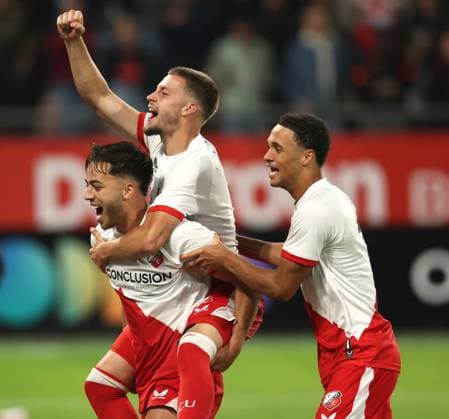 Souffian El Karouani of FC Utrecht with Dave van den Berg of FC Utrecht and Adrian Blake of FC Utrecht celebrate after reaching Europa League after the match FC Utrecht Zrinjski at the Galgenwaard for the Europa League play off season 2024 2025 in Utrecht, Netherlands on 28 august 2025, photo by Peter Lous EYE4images DeFodi Images