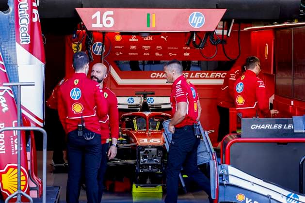 Scuderia Ferrari mechanics working on the car of Charles Leclerc in the pit box during the Formula 1 Heineken Dutch Grand Prix 2025 on Day 1 at Circuit Zandvoort on August 29, 2025 in Zandvoort, Netherlands Photo by Marcel ter Bals DeFodi Images