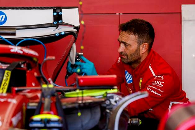 Scuderia Ferrari mechanics working on the car of Charles Leclerc in the pit box during the Formula 1 Heineken Dutch Grand Prix 2025 on Day 1 at Circuit Zandvoort on August 29, 2025 in Zandvoort, Netherlands Photo by Marcel ter Bals DeFodi Images