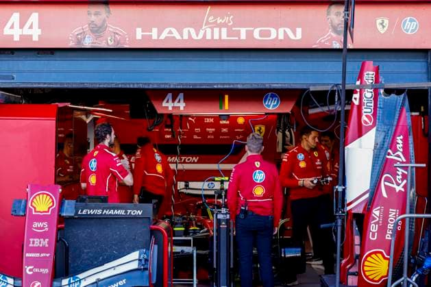 Scuderia Ferrari mechanics working on the car of Lewis Hamilton in the pit box during the Formula 1 Heineken Dutch Grand Prix 2025 on Day 1 at Circuit Zandvoort on August 29, 2025 in Zandvoort, Netherlands Photo by Marcel ter Bals DeFodi Images