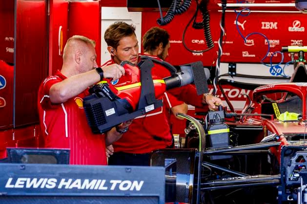 Scuderia Ferrari mechanics working on the car of Lewis Hamilton in the pit box during the Formula 1 Heineken Dutch Grand Prix 2025 on Day 1 at Circuit Zandvoort on August 29, 2025 in Zandvoort, Netherlands Photo by Marcel ter Bals DeFodi Images