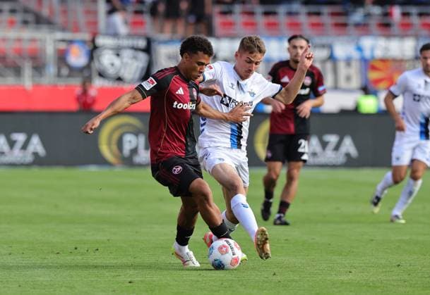29 08 2025 Soccer Season 2025 2026 2 Soccer Bundesliga 04 Matchday 1 FC Nürnberg FCN Club SC Paderborn 07 SCP Sportfoto Zink DaMa xdaxmax DFL regulations prohibit any use of photographs as image sequences and or quasi video only for editorial use Henri Koudossou 8, 1 FC Nürnberg FCN Filip Bilbija 7, SC Paderborn 07
