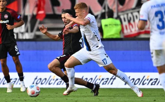 29 08 2025 Soccer Season 2025 2026 2 Soccer Bundesliga 04 Matchday 1 FC Nürnberg FCN Club SC Paderborn 07 SCP Sportfoto Zink xwoxzix DFL regulations prohibit any use of photographs as image sequences and or quasi video only for editorial use Berkay Yilmaz 21, 1 FC Nürnberg FCN Laurin Curda 17, SC Paderborn 07