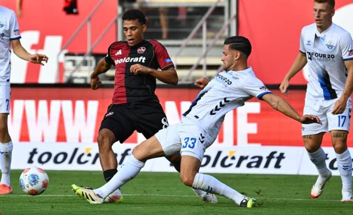 29 08 2025 Soccer Season 2025 2026 2 Soccer Bundesliga 04 Matchday 1 FC Nürnberg FCN Club SC Paderborn 07 SCP Sportfoto Zink xwoxzix DFL regulations prohibit any use of photographs as image sequences and or quasi video only for editorial use Henri Koudossou 8, 1 FC Nürnberg FCN Marcel Hoffmeier 33, SC Paderborn