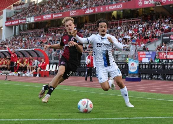 29 08 2025 Soccer Season 2025 2026 2 Soccer Bundesliga 04 Matchday 1 FC Nürnberg FCN Club SC Paderborn 07 SCP Sportfoto Zink DaMa xdaxmax DFL regulations prohibit any use of photographs as image sequences and or quasi video only for editorial use Tim Janisch 32, 1 FC Nürnberg FCN Mika Baur 14, SC Paderborn 07