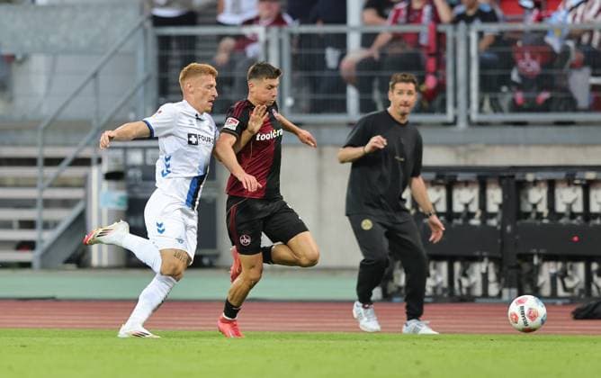 29 08 2025 Soccer Season 2025 2026 2 Soccer Bundesliga 04 Matchday 1 FC Nürnberg FCN Club SC Paderborn 07 SCP Sportfoto Zink DaMa xdaxmax DFL regulations prohibit any use of photographs as image sequences and or quasi video only for editorial use Laurin Curda 17, SC Paderborn 07 Semir Telalovic 9, 1 FC Nürnberg FCN watched by Miroslav Miro Klose coach 1 FC Nürnberg FCN