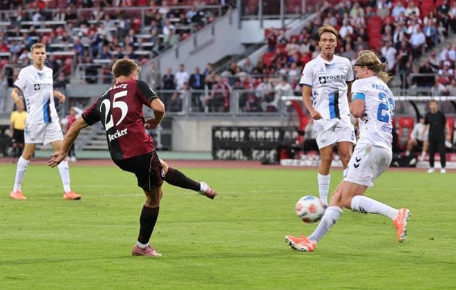 29 08 2025 Soccer season 2025 2026 2 Soccer Bundesliga 04 Matchday 1 FC Nürnberg FCN Club SC Paderborn 07 SCP Sportfoto Zink DaMa xdaxmax DFL regulations prohibit any use of photographs as image sequences and or quasi video only for editorial use Finn Ole Becker 25, 1 FC Nürnberg FCN with shot on goal gg Felix Götze 20, SC Paderborn 07