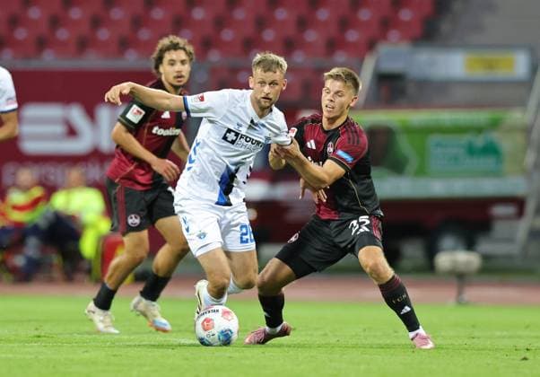 29 08 2025 Soccer Season 2025 2026 2 Soccer Bundesliga 04 Matchday 1 FC Nürnberg FCN Club SC Paderborn 07 SCP Sportfoto Zink DaMa xdaxmax DFL regulations prohibit any use of photographs as image sequences and or quasi video only for editorial use Sebastian Klaas 26, SC Paderborn 07 Finn Ole Becker 25, 1 FC Nürnberg FCN