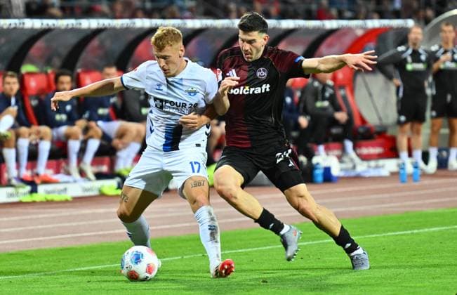 29 08 2025 Soccer Season 2025 2026 2 Soccer Bundesliga 04 Matchday 1 FC Nürnberg FCN Club SC Paderborn 07 SCP Sportfoto Zink xwoxzix DFL regulations prohibit any use of photographs as image sequences and or quasi video only for editorial use Laurin Curda 17, SC Paderborn 07 Luka Lochoshvili 24, 1 FC Nürnberg FCN