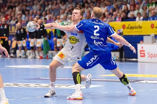 29 08 2025, xydrx, Handball, 1 HBL, TBV Lemgo Lippe SC Magdeburg, PHOENIX Contact Arena Felix Claar SC Magdeburg 7 in duel against Lukas Hutecek TBV Lemgo Lippe 2 Nordrhein Westfahlen Germany