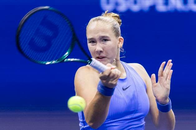 Mirra Andreeva of Russia returns a ball to Taylor Townsend in the third round in Arthur Ashe Stadium on day 6 at the 2025 US Open Tennis Championship at the USTA Billie Jean King National Tennis Center in New York City on Friday, August 29, 2025.  NYP20250829835 COREYxSIPKIN