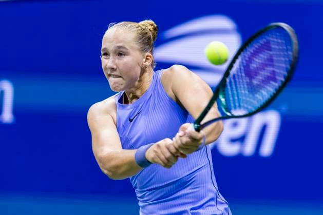 Mirra Andreeva of Russia returns a ball to Taylor Townsend in the third round in Arthur Ashe Stadium on day 6 at the 2025 US Open Tennis Championship at the USTA Billie Jean King National Tennis Center in New York City on Friday, August 29, 2025.  NYP20250829844 COREYxSIPKIN