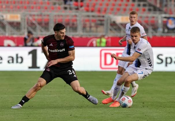 29 08 2025 Soccer Season 2025 2026 2 Soccer Bundesliga 04 Matchday 1 FC Nürnberg FCN Club SC Paderborn 07 SCP Sportfoto Zink DaMa xdaxmax DFL regulations prohibit any use of photographs as image sequences and or quasi video only for editorial use Luka Lochoshvili 24, 1 FC Nürnberg FCN Filip Bilbija 7, SC Paderborn 07