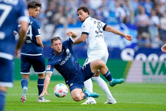 Maximilian Wittek VfL Bochum and Etienne Amenyido Preußen Münster battle for the ball during the 2 Bundesliga match between VfL Bochum and Preußen Münster, Vonovia Ruhrstadion on August 30, 2025 in Bochum, Germany Photo by Alex Gottschalk DeFodi Images Maximilian Wittek VfL Bochum and Etienne Amenyido Preußen Münster battle for the ball during the 2 Bundesliga match between VfL Bochum and Preußen Münster at Vonovia Ruhrstadion on August 30, 2025 in Bochum, Germany Photo by Alex Gottschalk DeFodi Images DFB DFL REGULATIONS PROHIBIT ANY USE OF PHOTOGRAPHS AS IMAGE SEQUENCES AND OR QUASI VIDEO Photo by Alex Gottschalk DeFodi Images DFB DFL REGULATIONS PROHIBIT ANY USE OF PHOTOGRAPHS AS IMAGE SEQUENCES AND OR QUASI VIDEO