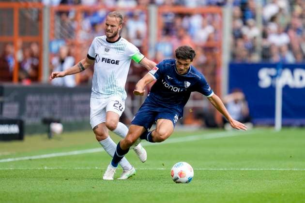 Jorrit Hendrix Preußen Münster and Kjell Wätjen VfL Bochum battle for the ball during the 2 Bundesliga match between VfL Bochum and Preußen Münster, Vonovia Ruhrstadion on August 30, 2025 in Bochum, Germany Photo by Alex Gottschalk DeFodi Images Jorrit Hendrix Preußen Münster and Kjell Wätjen VfL Bochum battle for the ball during the 2 Bundesliga match between VfL Bochum and Preußen Münster at Vonovia Ruhrstadion on August 30, 2025 in Bochum, Germany Photo by Alex Gottschalk DeFodi Images DFB DFL REGULATIONS PROHIBIT ANY USE OF PHOTOGRAPHS AS IMAGE SEQUENCES AND OR QUASI VIDEO Photo by Alex Gottschalk DeFodi Images DFB DFL REGULATIONS PROHIBIT ANY USE OF PHOTOGRAPHS AS IMAGE SEQUENCES AND OR QUASI VIDEO