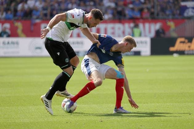 Boris Tomiak Hannover 96 , Alexander Bernhardsson Holstein Kiel Football, Men, Season 2025 2026, 2 BL, Holstein Stadion, Holstein Kiel vs Hannover 96 DFL REGULATIONS PROHIBIT ANY USE OF PHOTOGRAPHS AS IMAGE SEQUENCES AND OR QUASI VIDEO