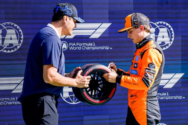 Julio Ricardo Cruz of Argentina and Pole position qualifier Oscar Piastri of Australia and McLaren F1 Team with pole position award competing in the Qualification of the Formula 1 Heineken Dutch Grand Prix 2025 on Day 2 at Circuit Zandvoort on August 30, 2025 in Zandvoort, Netherlands Photo by Marcel ter Bals DeFodi Images