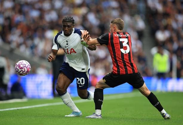 Tottenham Hotspur v Bournemouth Premier League 30 08 2025. Tottenham Hotspur Forward Mohammed Kudus (20) Battles for the ball with Bournemouth Defender Adrien Truffert (3) during the Premier League match between Tottenham Hotspur and Bournemouth at Tottenham Hotspur Stadium, London, United Kingdom on 30 August 2025. London Tottenham Hotspur Stadium London United Kingdom Editorial use only DataCo restrictions apply See www.football-dataco.com , Copyright: xChrisxFoxwellx PSI-22713-0021