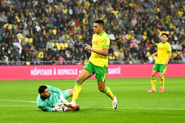 FC Nantes v AJ Auxerre - Ligue 1 McDonald s 2025 2026 40 Theo DE PERCIN (aja) - 31 Mostafa MOHAMED (fcn) during the Ligue 1 McDonald s match between Nantes and Auxerre at Stade de la Beaujoire on August 30, 2025 in Nantes, France. Nantes France  Copyright: xFEPx 776348115