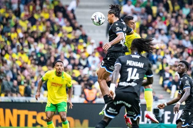 FOOTBALL : FC Nantes vs AJ Auxerre - Ligue 1 - JournÃ e 3 - 30 08 2025 Mostafa Mohamed (FC NANTES) Clement Akpa (AJ Auxerre) NantesFrance  Copyright: xBaptistexAutissierx