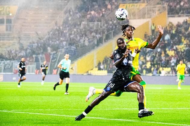 FOOTBALL : FC Nantes vs AJ Auxerre - Ligue 1 - JournÃ e 3 - 30 08 2025 Lassine Sinayoko (AJ Auxerre) Tylel Tati (FC NANTES) NantesFrance  Copyright: xBaptistexAutissierx