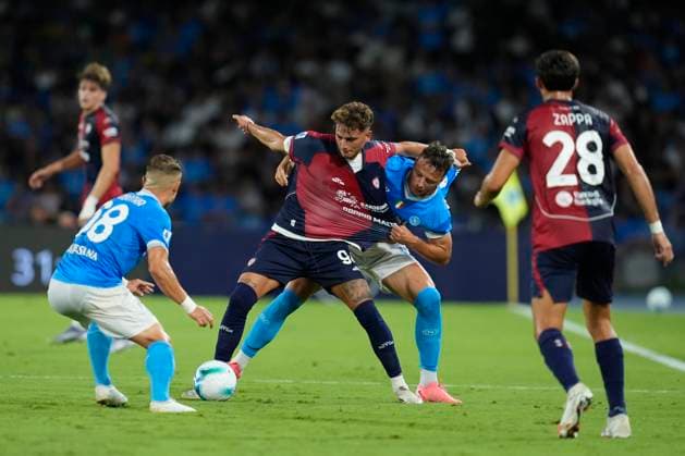 Sebastiano Esposito (Cagliari Calcio) and Amir Rrahmani (SSC Napoli) battle for the ball, Serie A, SSC Napoli v Cagliari Calcio, Diego Maradona Stadium, August 30, 2025, Naples, Italy.
